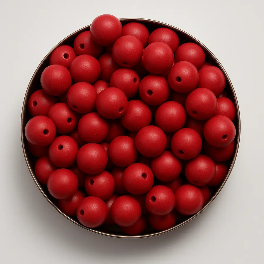 koule dřevěné, barvené,  prům. 24 - 25 mm, vrtané skrz